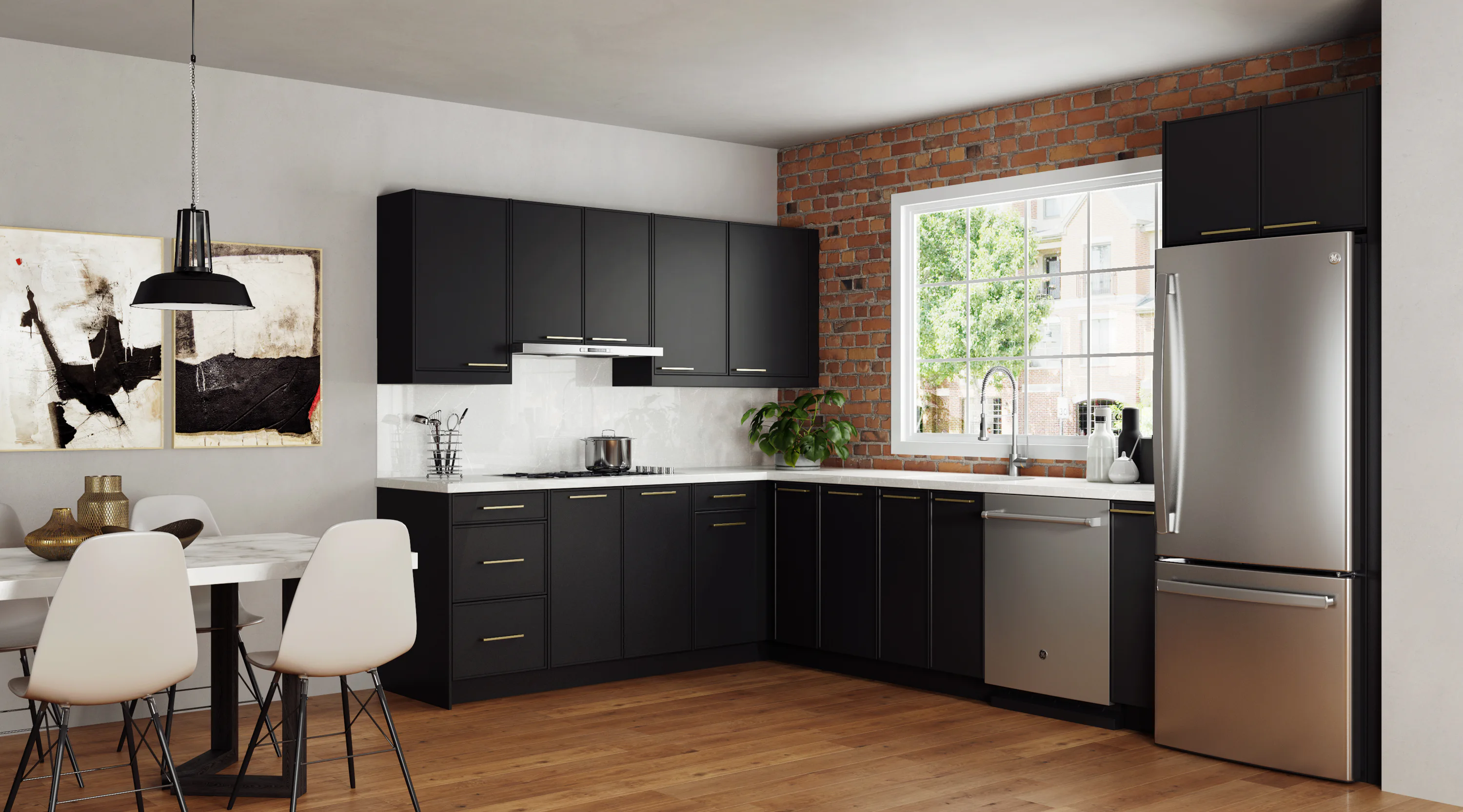 Modern kitchen with black cabinets, stainless steel appliances, and wood flooring. A dining area with white chairs and a table is on the left, artworks and a brick wall add style.