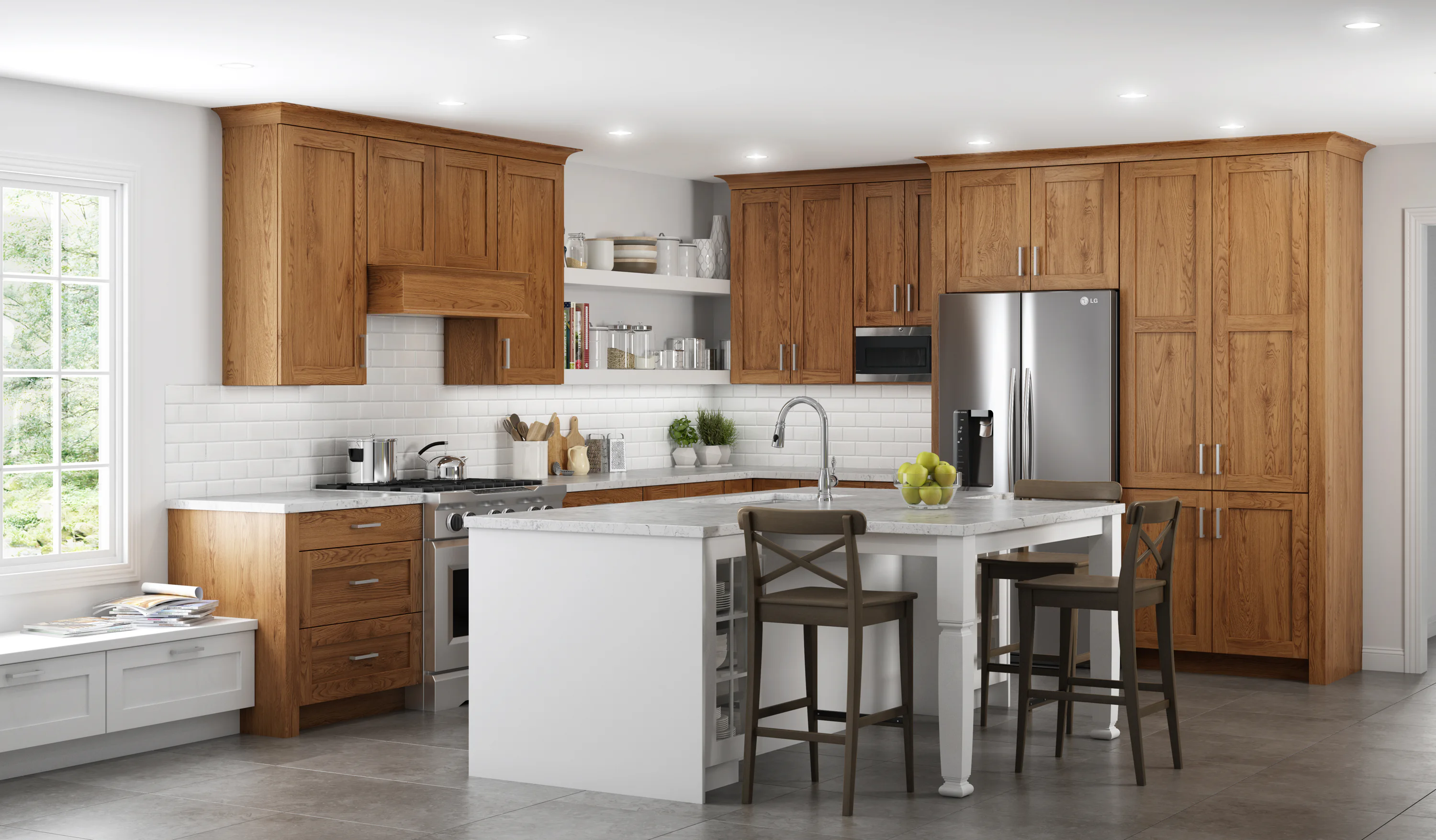 Modern kitchen with wooden cabinets, white subway tile backsplash, and gray floor tiles. Features a stainless steel fridge, oven, and a white island with bar stools and fruit bowl.