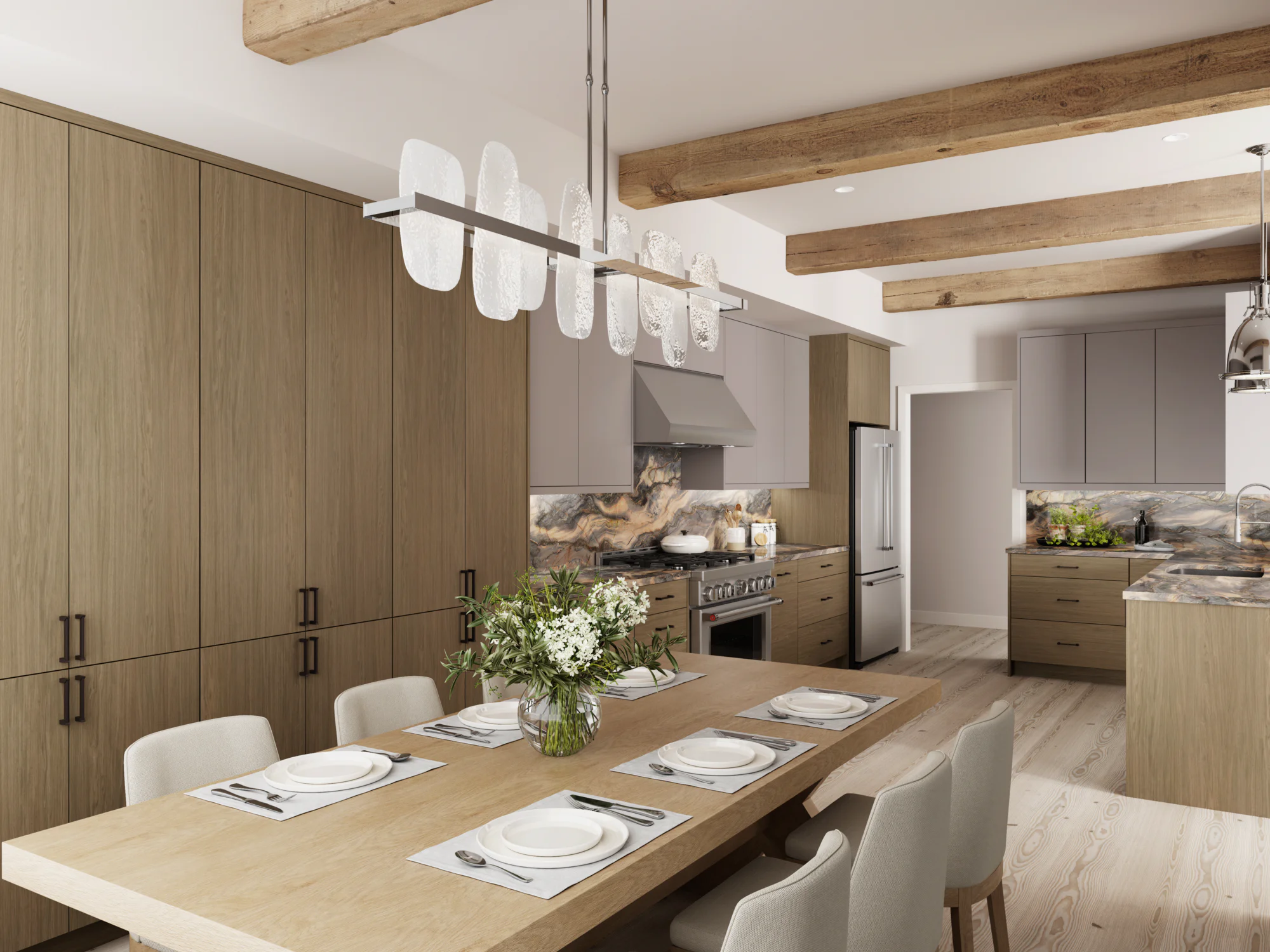 Open-plan modern kitchen and dining area with wood cabinets, marble backsplash, exposed beams and set dining table