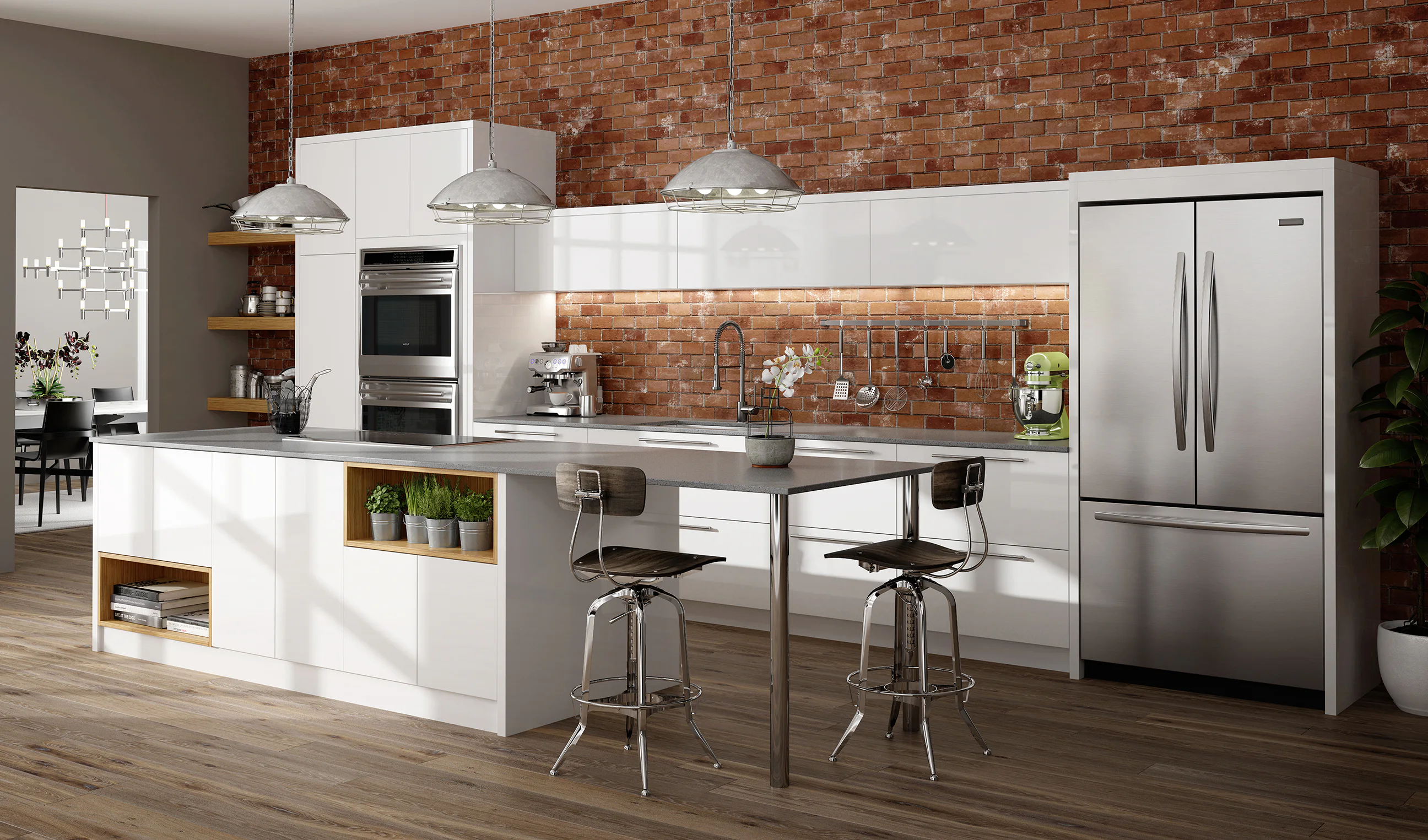 Modern kitchen with brick wall, white cabinets, and stainless steel appliances. Features an island with bar stools, pendant lighting, potted plants, and wood flooring.