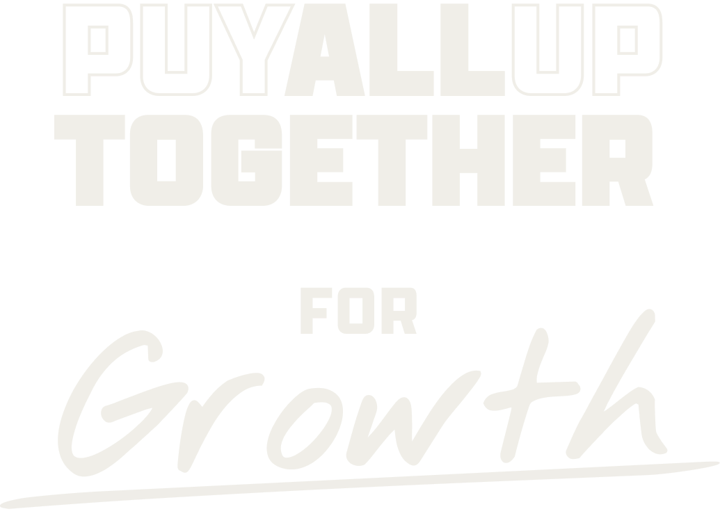 White text on black background reading 'PUYALLUP TOGETHER FOR Growth' with underlined script 'Growth'.