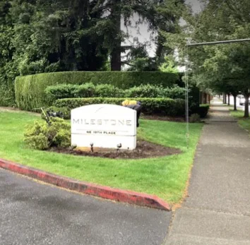 A white sign reading 