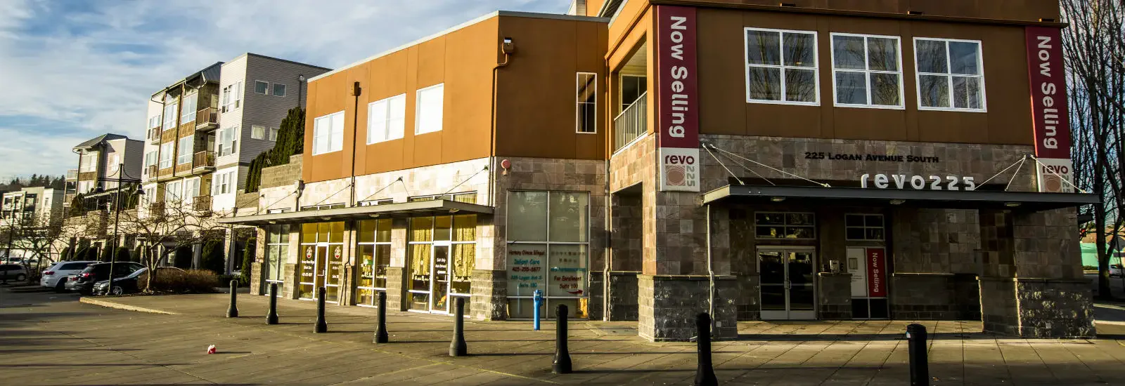 Street view of a commercial building at 225 Logan Avenue South with 