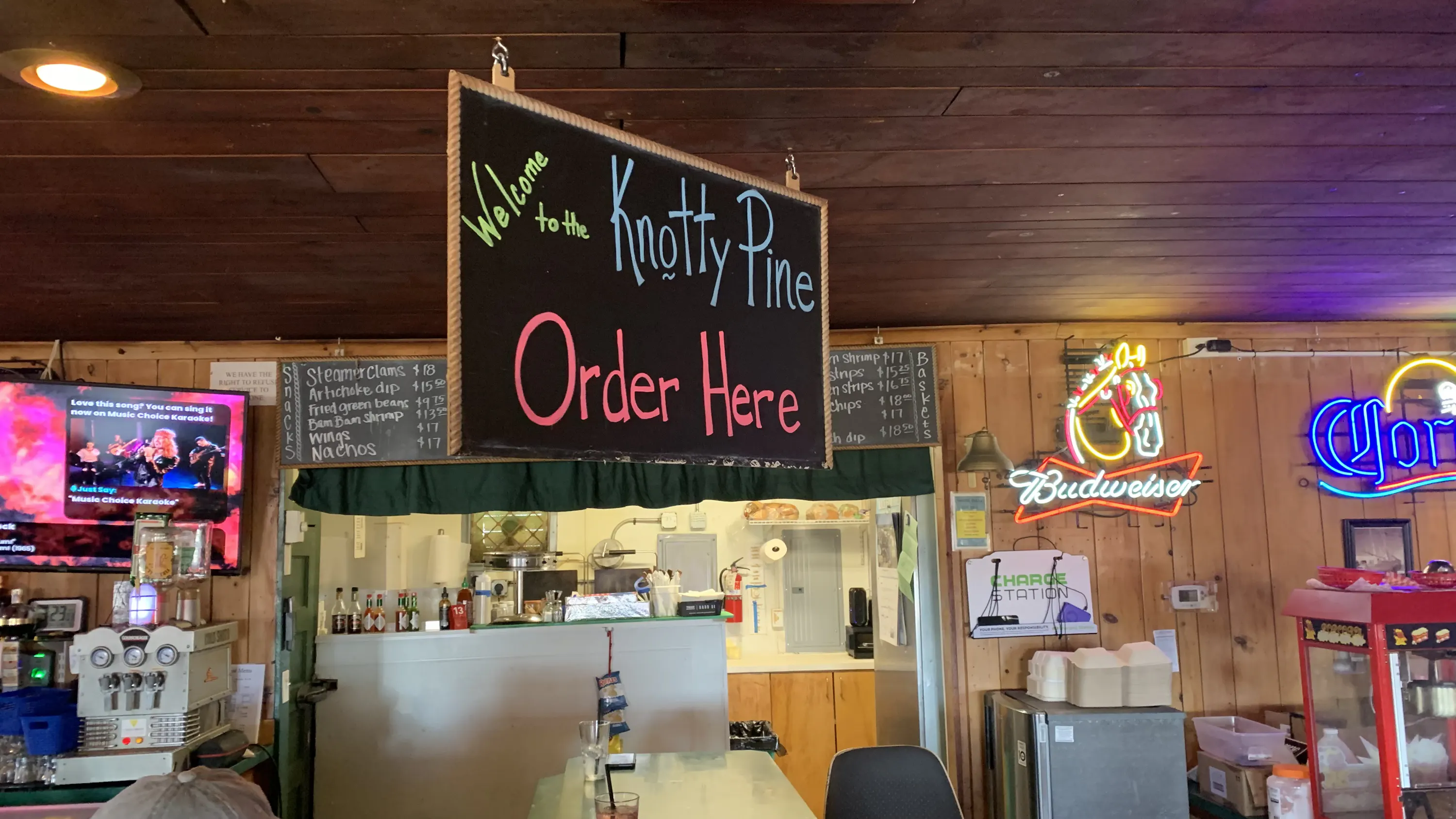 Hanging sign reads 