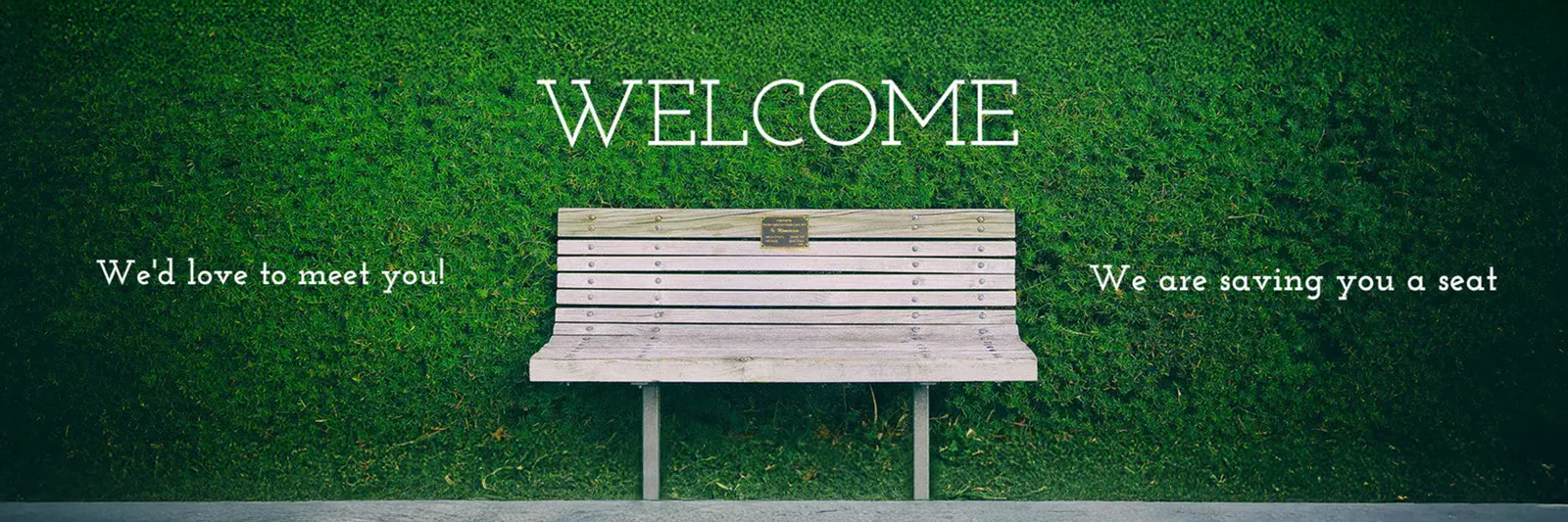 A wooden bench against a green hedge with the words Welcome, We'd love to meet you, and We are saving you a seat
